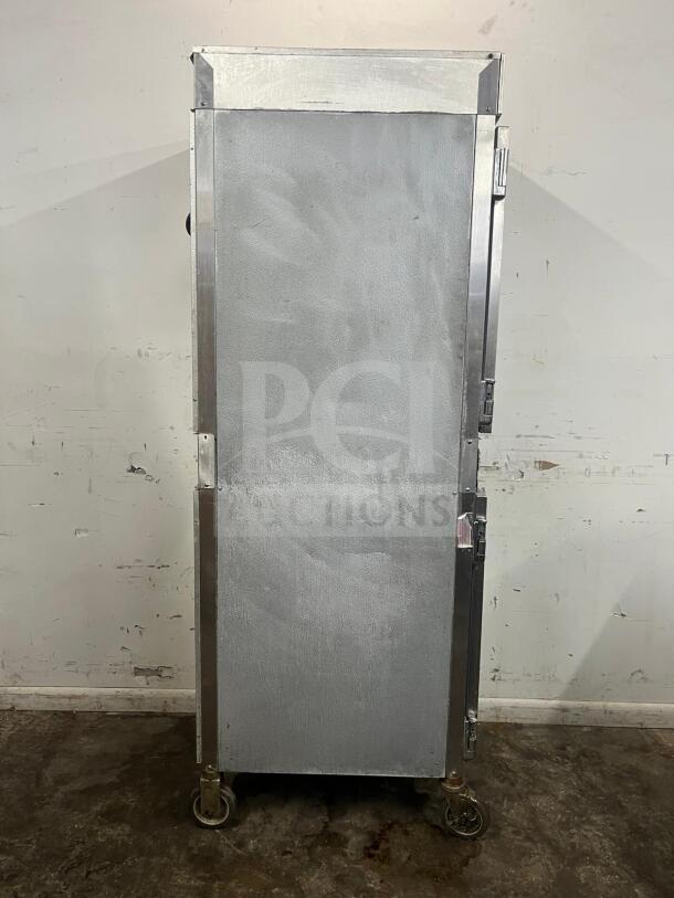 Alto-Shaam 1000-UP Holding Cabinet, 120V, stainless steel, durable casters, used condition, secure insulation doors.