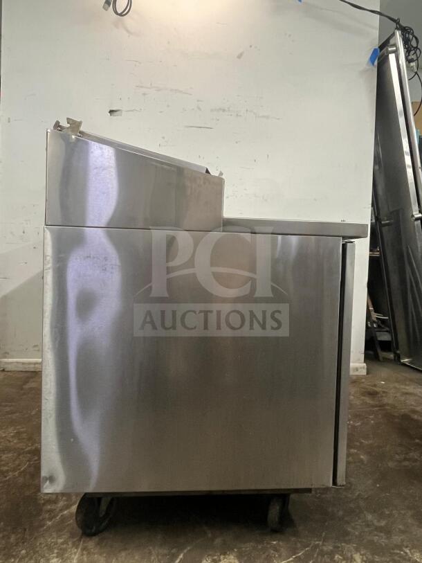 RANDELL 8268N 68" refrigerated pizza prep table, 2 sections, 2 doors, stainless steel, on casters, 17.76 cu. ft. capacity.