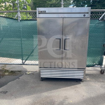TRUE T-49-HC 54" Reach-In Refrigerator, two solid doors, good condition, left/right hinge, 115v, sturdy stainless exterior.