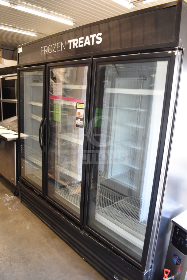 2017 True GDM-72F-HC 3-door reach-in freezer merchandiser, glass doors, "Frozen Treats" label, tested, working condition.