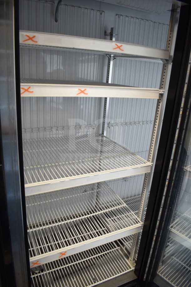 2017 True GDM-72F-HC commercial 3-door freezer merchandiser. White wire shelves, tested and working, 115/208-230V, 1 phase.