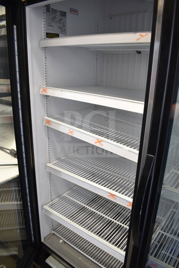 2017 True GDM-72F-HC commercial 3-door reach-in freezer, features multiple shelves, tested and working, 115/208-230V, 1 phase.