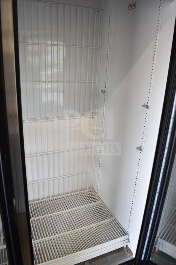 2017 True GDM-72F-HC commercial 3-door freezer merchandiser, white interior, adjustable shelves, excellent condition.