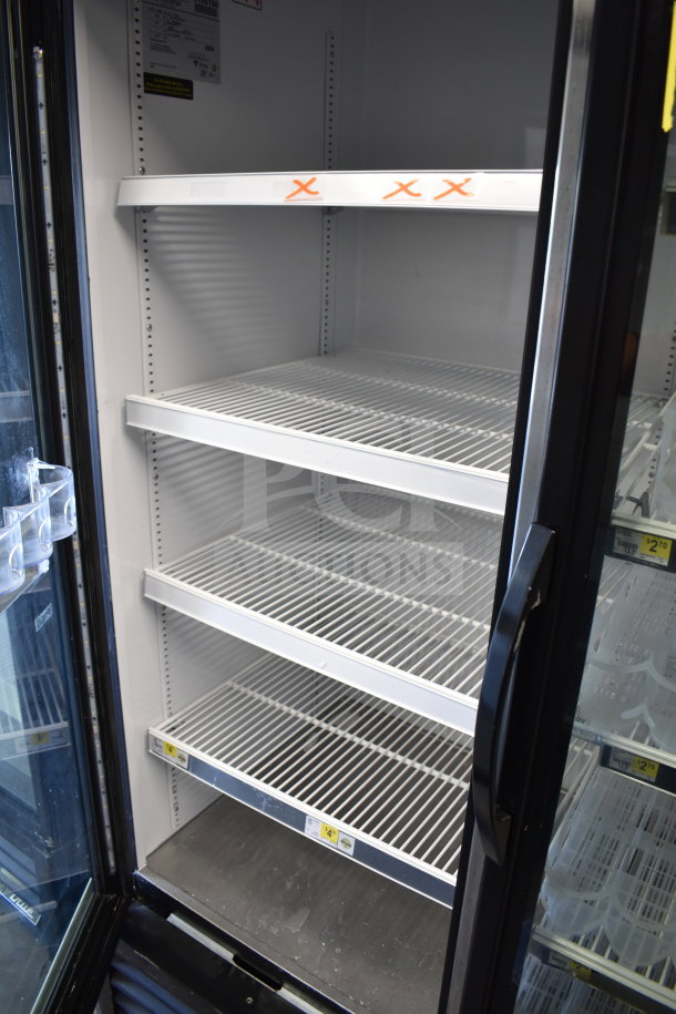 2017 True GDM-72-HC Cooler, 3-door, reach-in, tested working, 115 volts, 1 phase, clean shelves, commercial use.