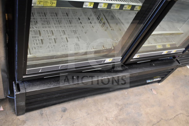 2017 True GDM-49-HC commercial cooler, 2 glass doors, tested working, 115 volts, 1 phase, visible price stickers.