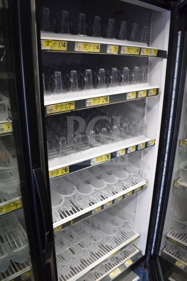 2017 True GDM-49-HC commercial cooler, 2-door, 115 volts, 1 phase. Shelves with price labels. Tested, working condition.