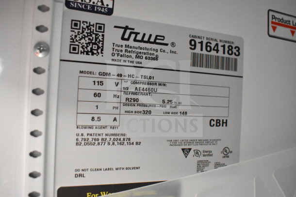 2017 True GDM-49-HC Commercial Cooler, 2-door, tested working, 115V, single-phase. Label shows specs and serial number.