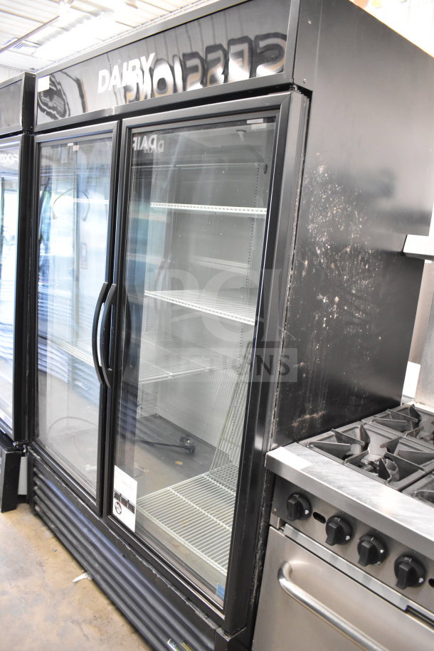 2019 True GDM-49-HC 2 door cooler merchandiser. Glass doors, metal shelves, black exterior. Tested, 115V, 1 phase.
