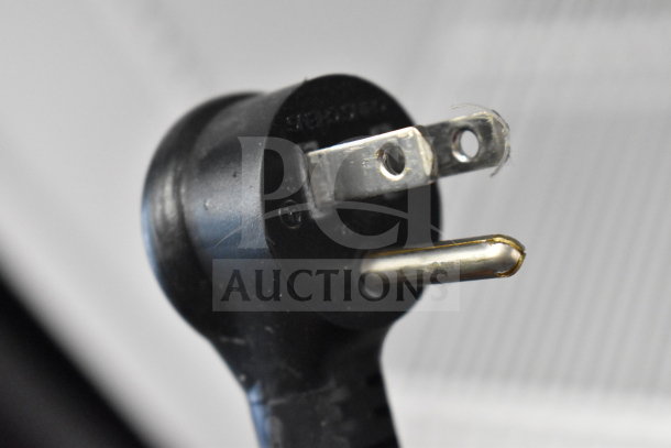 Close-up of a power plug for the 2019 True GDM-49-HC Commercial 2 Door Cooler, 115 volts, in tested working condition.