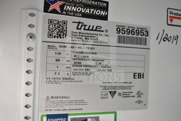 2019 True GDM-49-HC commercial cooler label; shows model, serial number 9596953, voltage, refrigerant details.