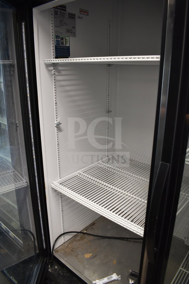 2019 True GDM-49-HC commercial 2-door cooler, 115V, tested working. Interior shelves, visible labels.