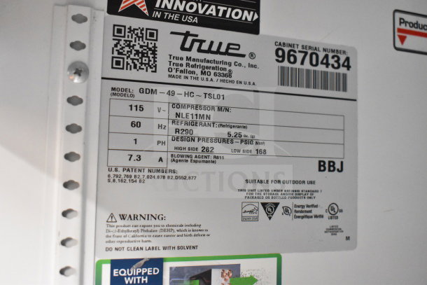 Label of 2019 True GDM-49-HC cooler, showing model, voltage, refrigerant type, and patent numbers. Verified working.