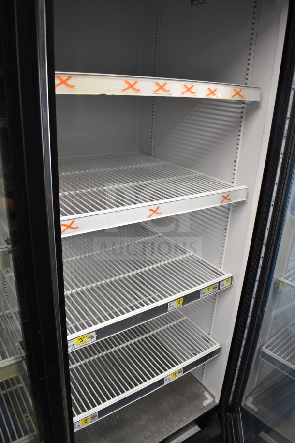 2017 True GDM-72-HC commercial cooler with 3 glass doors, adjustable shelving, tested and working, 115V, good condition.
