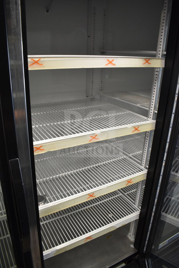 2017 True GDM-72-HC 3-door cooler merchandiser, tested and working, features adjustable shelves, 115 volts, 1 phase.