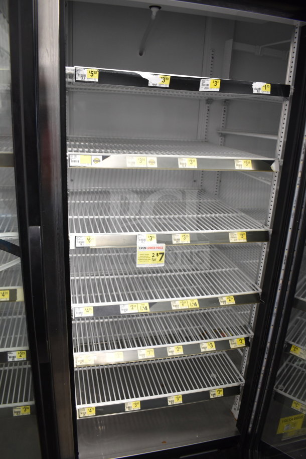 2018 True GDM-72-HC commercial 3-door cooler, tested and working, features adjustable shelves and clear pricing labels.