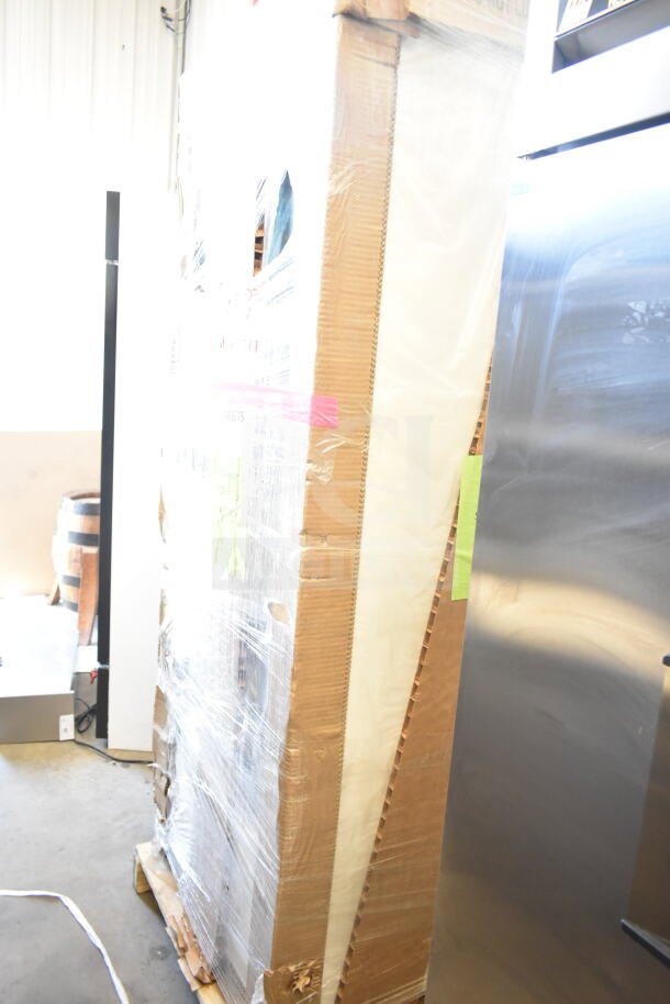 Brand new True TSCI-600R-G-PH Commercial Cooler, single door, 110-120V, 1 phase, scratch and dent, wrapped in packaging.