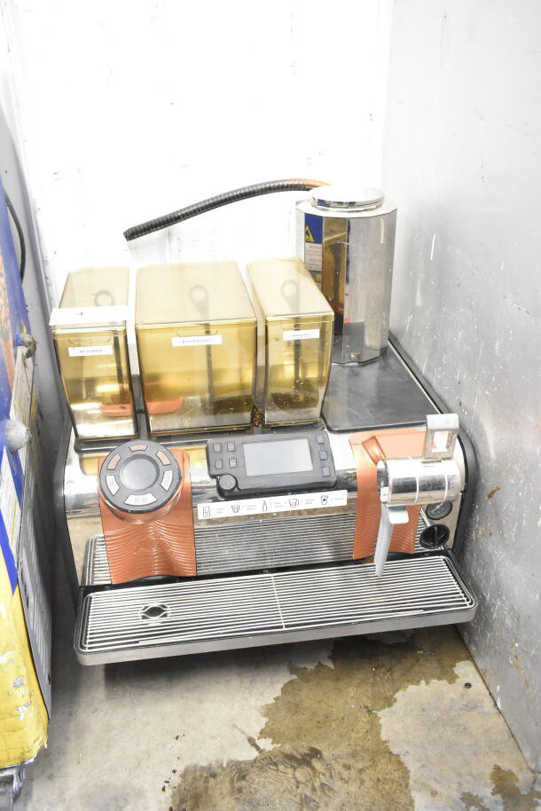 Thermoplan Mastrena stainless steel super automatic espresso machine with LCD display, hopper compartments, steam wand; commercial use.