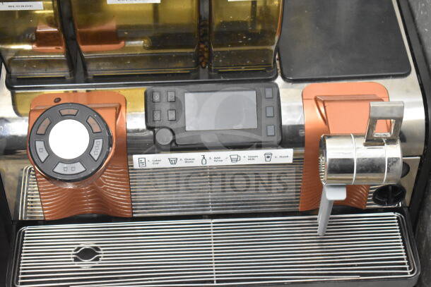 Thermoplan Mastrena stainless commercial espresso machine with LCD display, hoppers, and steam wand. 208V, 1 phase.