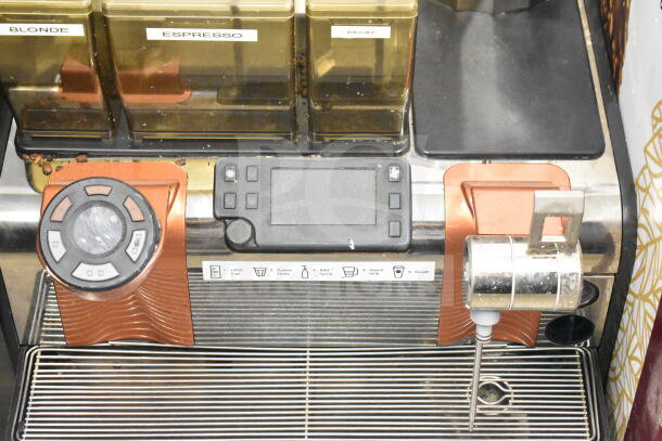 Thermoplan Mastrena stainless steel commercial espresso machine with LCD display, labeled hoppers, and steam wand. 208V, 1 Phase.