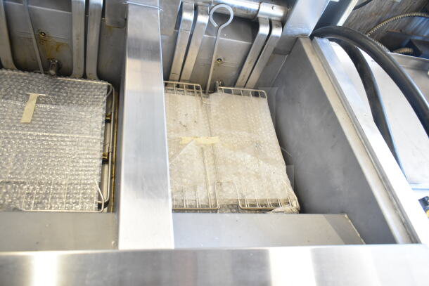 2021 Frymaster 3FQE30U0ZQ3ZZ14 electric fryer, 3 bays, 208V, 3-phase, with bubble-wrapped components, in good condition.