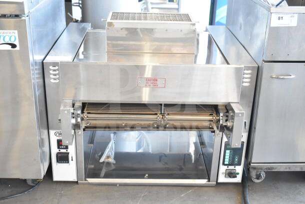 2021 Nieco JF93E electric conveyor charbroil grill, model JF93E, 208V, 3-phase, excellent condition, caution label shown.