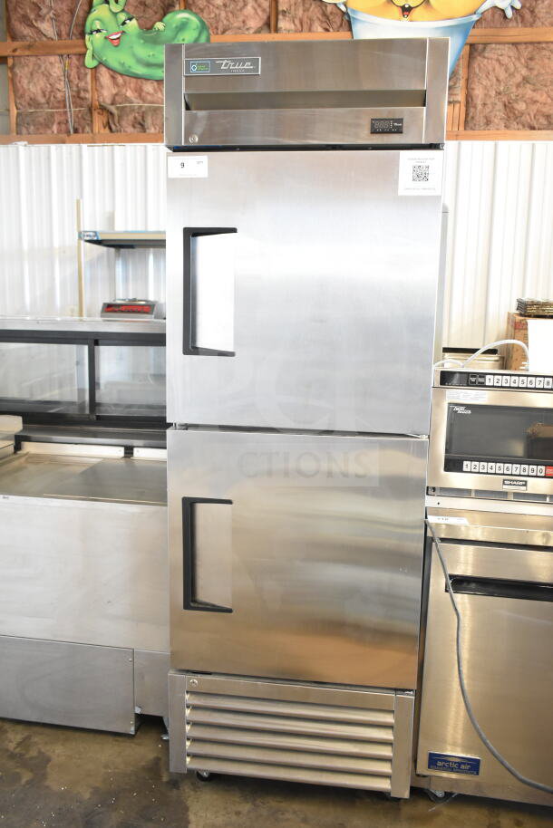 BRAND NEW 2021 True T-23F-2-HC-MC commercial freezer, 2 half-size doors, on casters, 115V, visible tags, stainless steel.