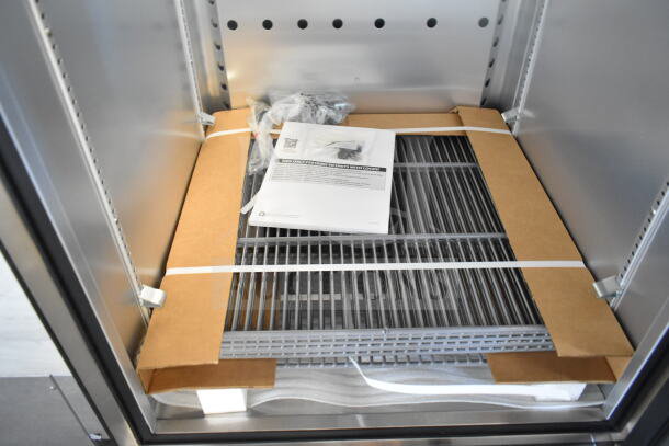 Brand new True T-23F-2-HC-MC freezer interior; includes shelves, manual; on commercial casters; 115 volts, 1 phase.