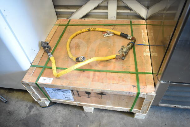Brand new Spectrum NGHP-6 gas-powered 6-burner range in crate. Scratch and dent condition, intact packaging labels visible.