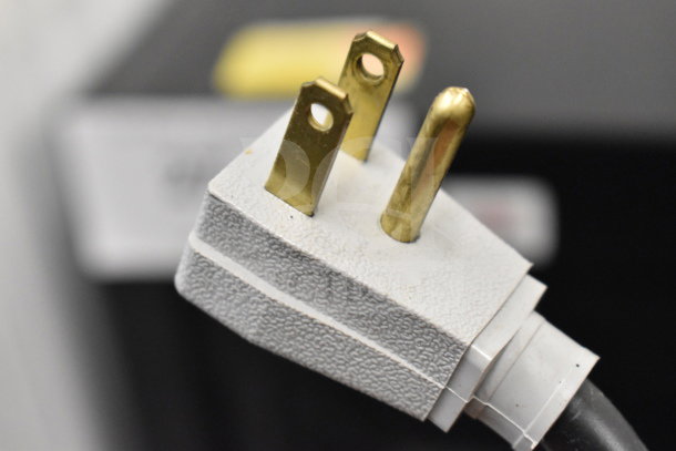 Close-up of a power plug for the 2020 True GDM-41SL-48-HC-LD commercial cooler, showing a 115 volts, 1 phase plug.