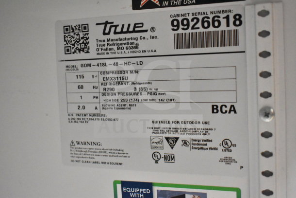 True GDM-41SL-48-HC-LD cooler label showing specs: 115 volts, EMX3115U compressor, R290 refrigerant, NSF certified.