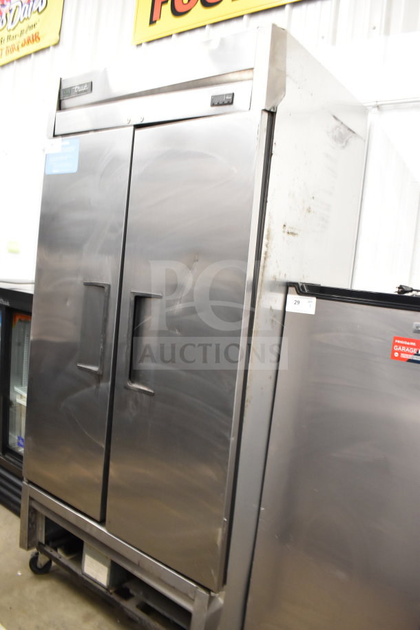 2020 True T-35-HC Commercial 2 Door Reach-In Cooler, stainless steel, 115 volts, 1 phase, visible wear marks.