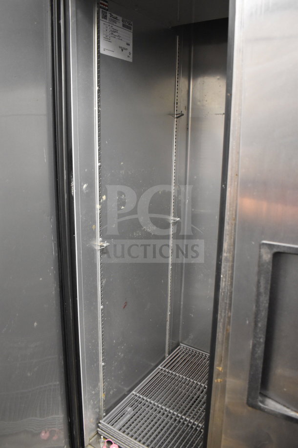 2020 True T-35-HC Commercial 2 Door Cooler, 115V, 1 Phase, interior view, shelves missing, model/serial label visible.