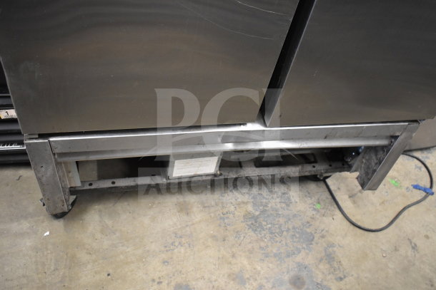 2020 True T-35-HC commercial 2-door reach-in cooler, stainless steel, visible usage wear, model label on base.