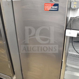 Frigidaire EFRF698-C Single Door Reach In Freezer, stainless steel, 115 Volts, 1 Phase, visible "Garage Ready" label.