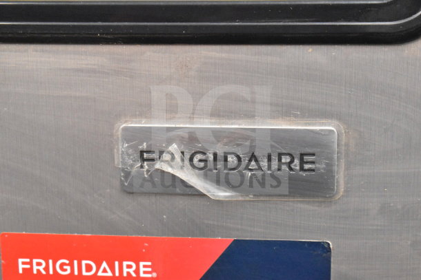 Frigidaire EFRF698-C single door reach-in freezer, stainless steel, visible Frigidaire brand label, 115 volts, 1 phase.