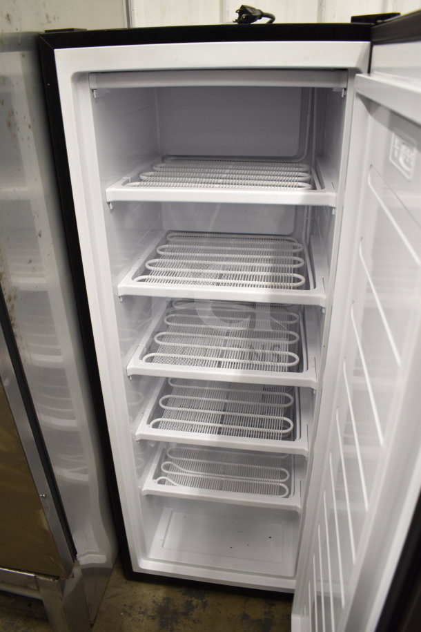 Frigidaire EFRF698-C single door reach-in freezer, 5 shelves, white interior, 115 volts, 1 phase, gently used.