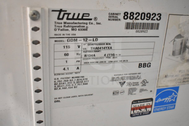 True GDM-12-LD cooler label, 115V, 1-phase, R134A refrigerant, compressor model THA0414YXA. Serial number 8820923.