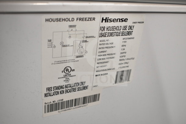 Hisense WFC070M6RWD chest freezer label showing model details: 115V, 60Hz, 1.5A, R600a refrigerant, free-standing use.