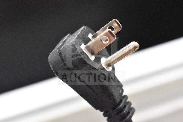 Close-up of a power plug for Hisense WFC070M6RWD Chest Freezer, 115 Volts, 1 Phase, showing three-prong design.