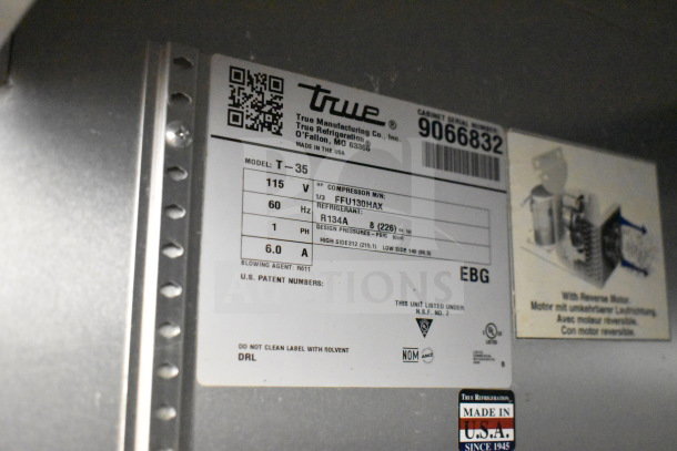 Label on 2017 True T-35 Commercial Cooler, showing model, voltage, phase, refrigerant, and manufacturer details.