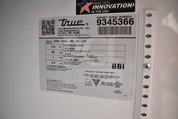 2018 True GDM-41SL-48-HC-LD cooler label with model info, 115 volts, R290 refrigerant, suitable for outdoor use.
