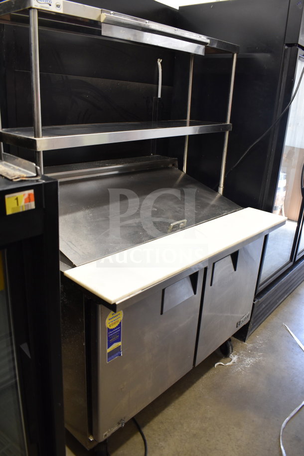 Everest EPBR2 sandwich salad prep table with bain marie mega top, two-tier shelf, 115V, 1 phase. Stainless steel, used.