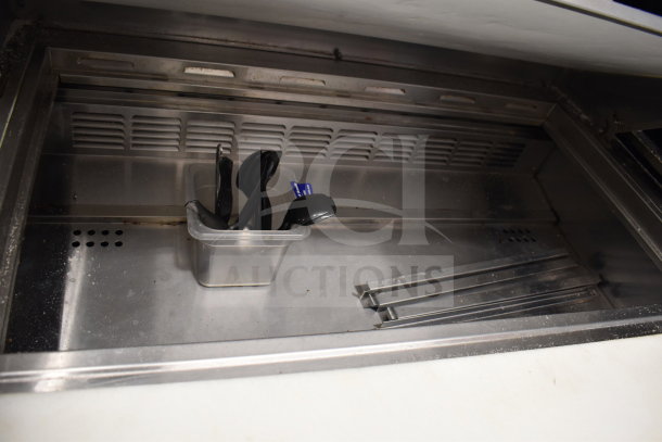 Everest EPBR2 Commercial Sandwich Salad Prep Table, stainless steel, with utensil bin, showing interior and shelf tracks.