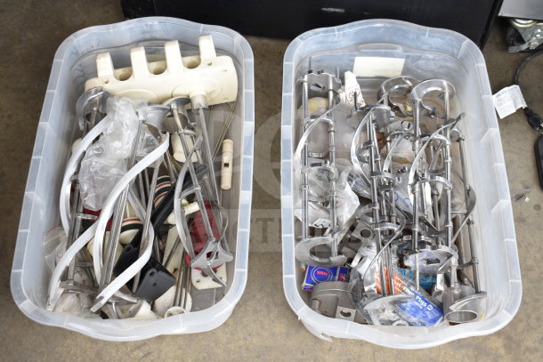 Lot of two bins with various ice cream machine parts including augers, in used condition.