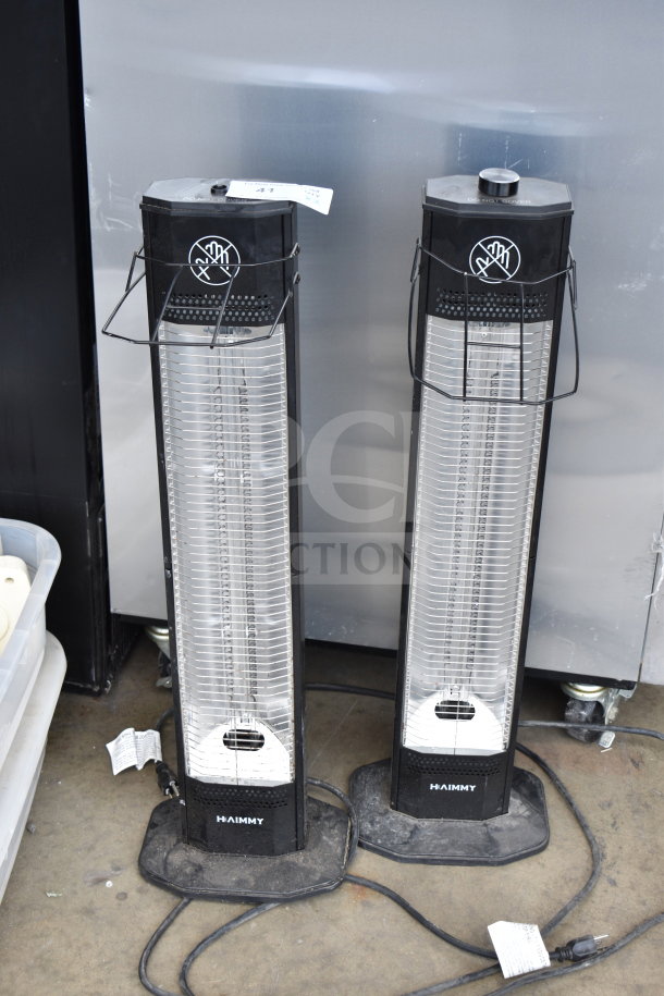 Pair of Haimmy UEH520 infrared electric heaters, 120 volts, 1 phase, black, with protective grilles, good condition.