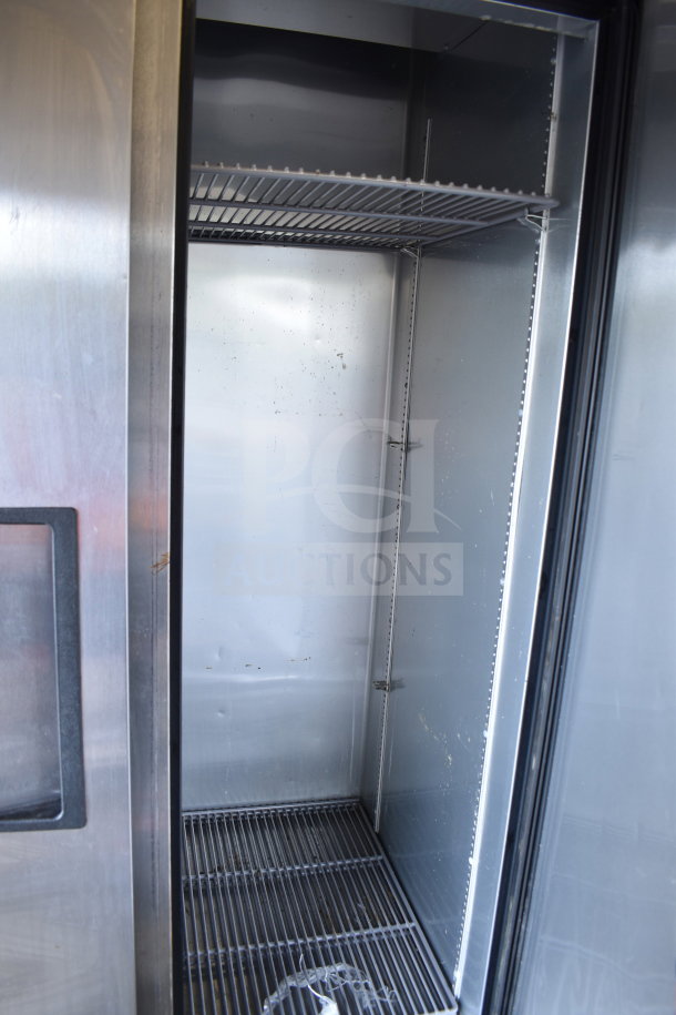 2017 True T-35-HC 2 Door Cooler, stainless interior, commercial casters, 115V, 1 phase, good condition, shelving included.
