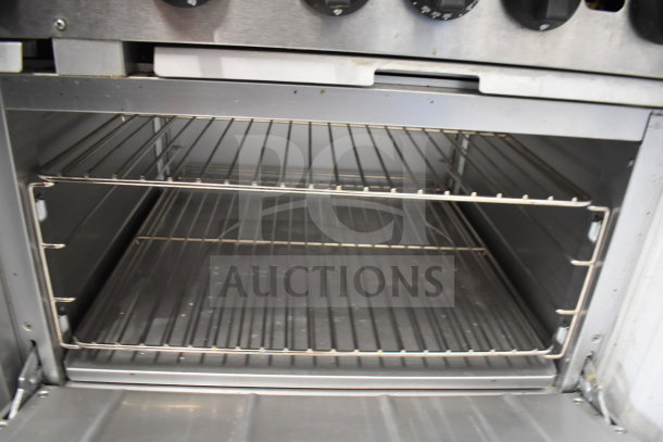 Mainstreet 541E60N commercial range oven interior, stainless steel racks, pristine condition, suitable for heavy-duty use.