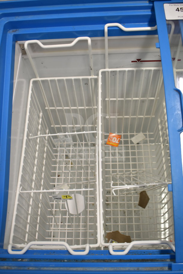 AHT RIO S 100 commercial chest freezer with dual wire baskets and blue trim. Excellent condition, 115V, 1 Phase.