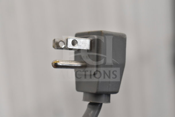AHT RIO S 100 Commercial Chest Freezer plug, 115 Volts, 1 Phase, close-up view.