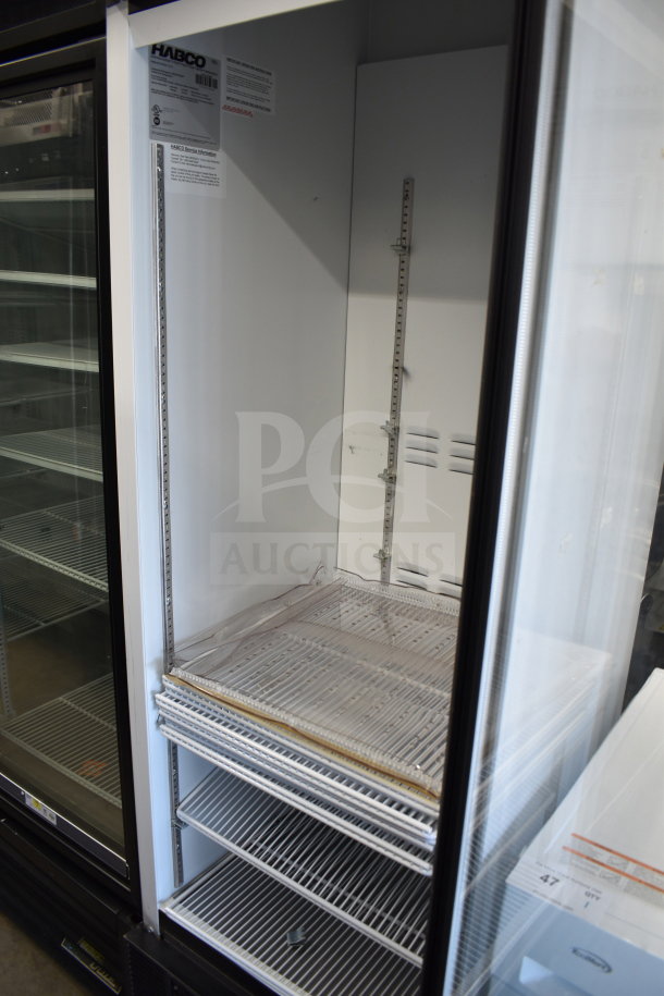 2019 Habco SE18 commercial single-door reach-in cooler. Features shelving, 115 volts, 1 phase. Clean interior.